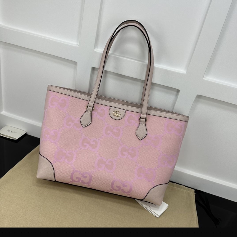 G*u*i shopping bags